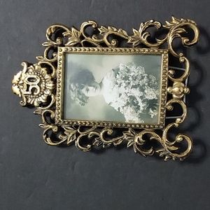 Vintage Ornate Frame with Stand by Enesco 1990 with 50 at the top.nice picture.